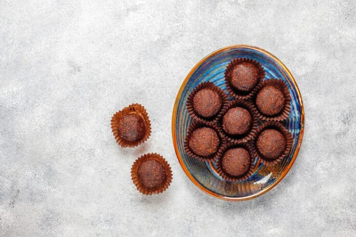 chocolate-balls-with-cocoa-powder_114579-12461