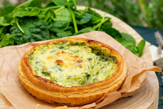 close-up-quiche-with-fresh-vegetables_131238-354