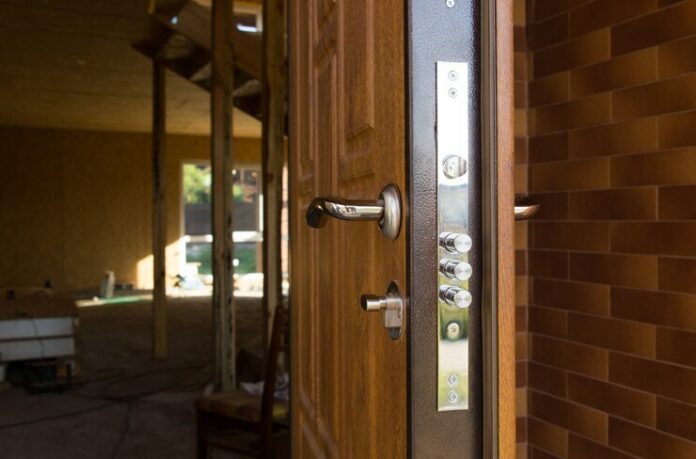 safety-lock-new-wooden-front-door-showing-three-security-cylinders-required-by-insurance-companies-best-premium-quotations_385506-3731